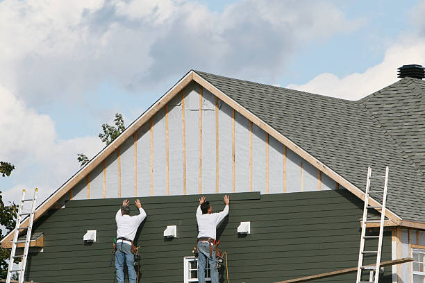 Professional Siding Replacement technician working in East Rochester, OH